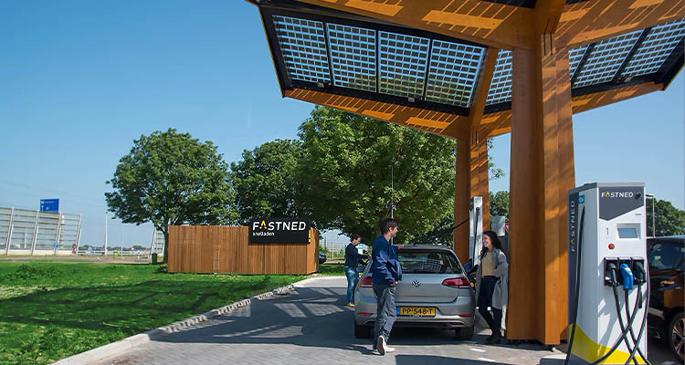 Cars at electric charging point