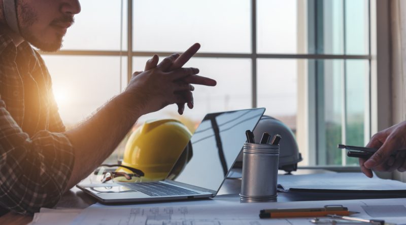 Photo of engineer discussing construction project