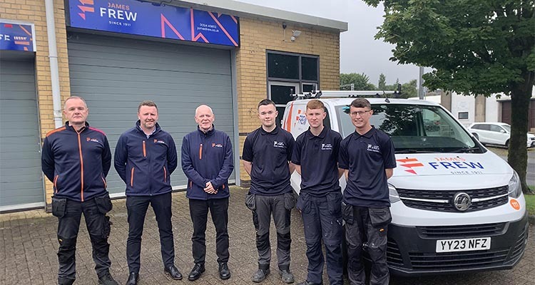 James Frew Ltd staff standing outside their offices
