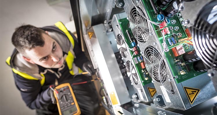 Electrician checking equipment