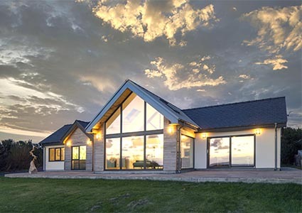house with large windoes in the evening