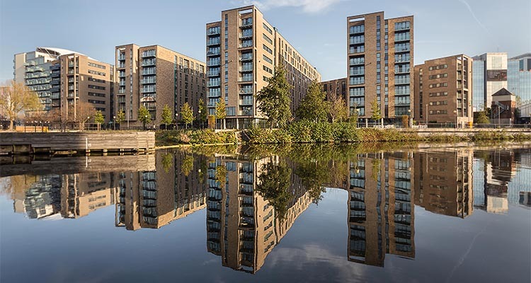 Flats viewed from across a river