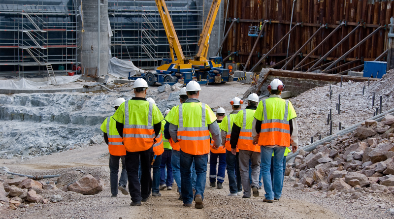 Construction site with workers highlighting the workforce shortage and the need for new labour to support construction workers article
