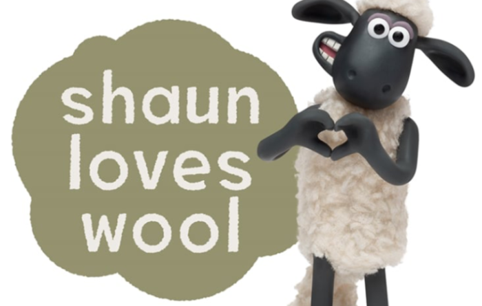 Shaun the Sheep character with 'Shaun Loves Wool' sign for the British Wool campaign